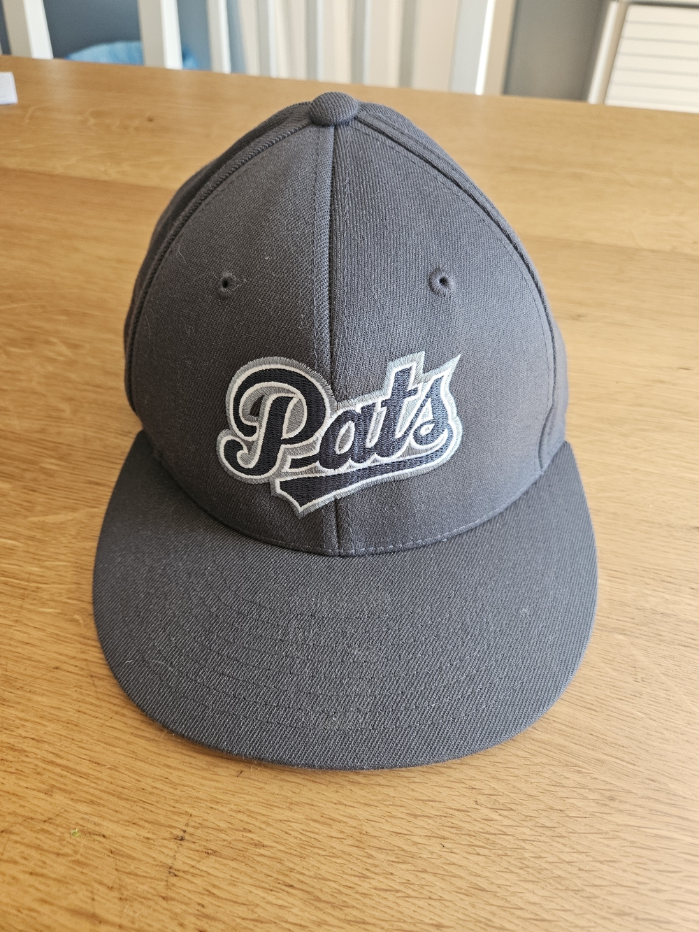 Regina Pat's Embroidered Gray Trucker Hat